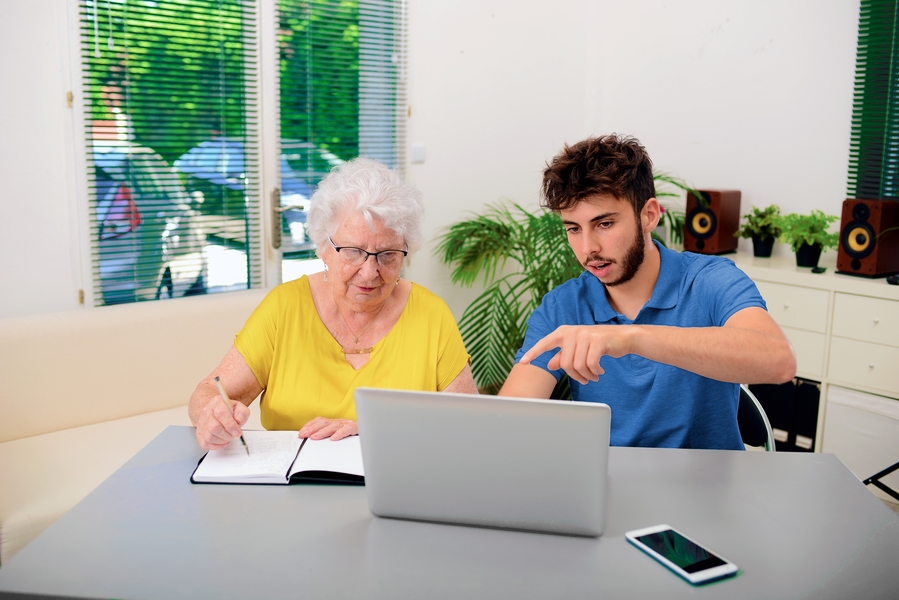 Tech Support In Home Of Senior Woman Working As A Computer Teacher In Montclair New Jersey